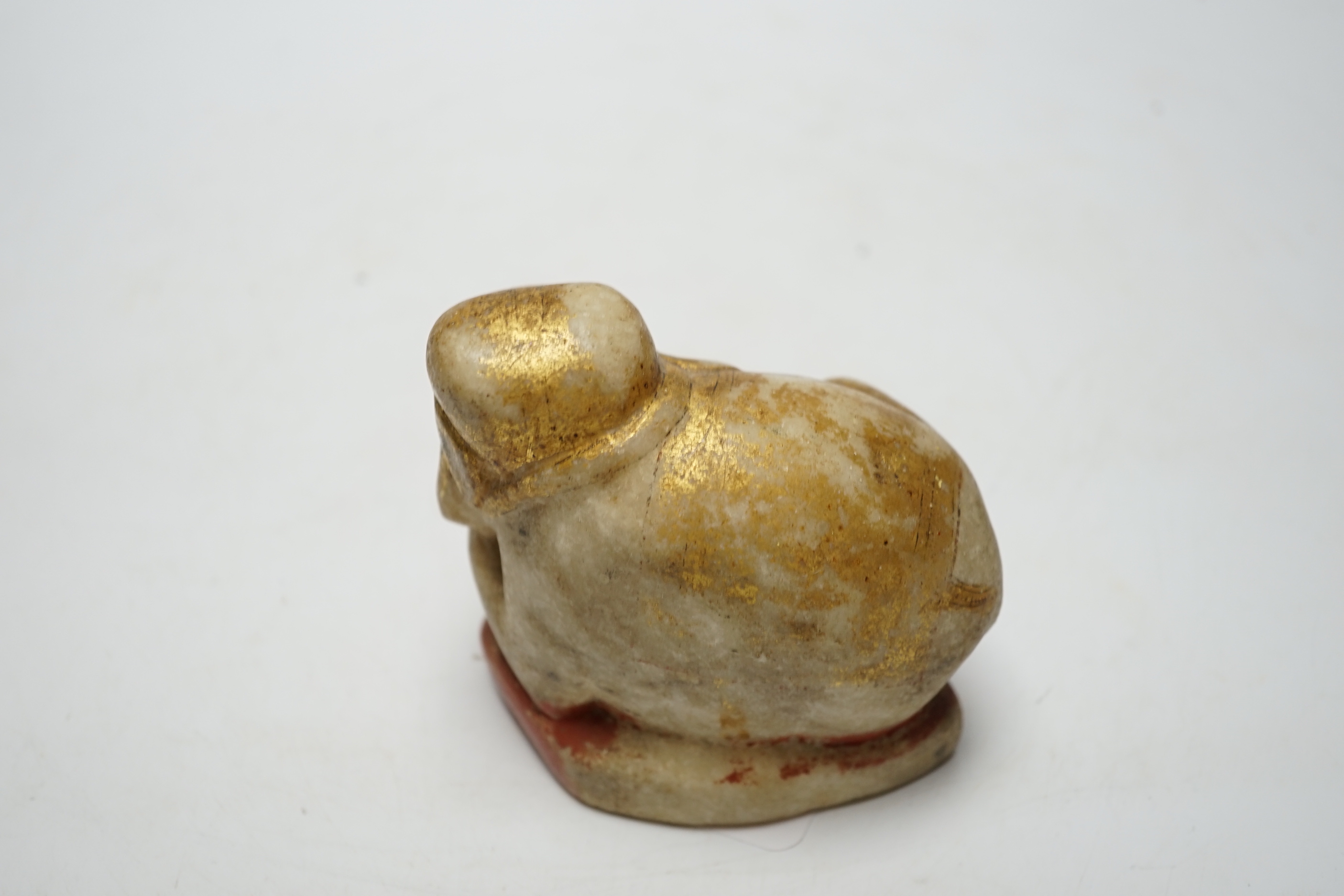 An Indian carved and painted alabaster model of an elephant, 10cm tall